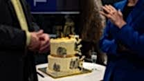A two tier cake with the number 50 on it.