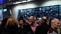 People socialise on the RNCM concourse. 